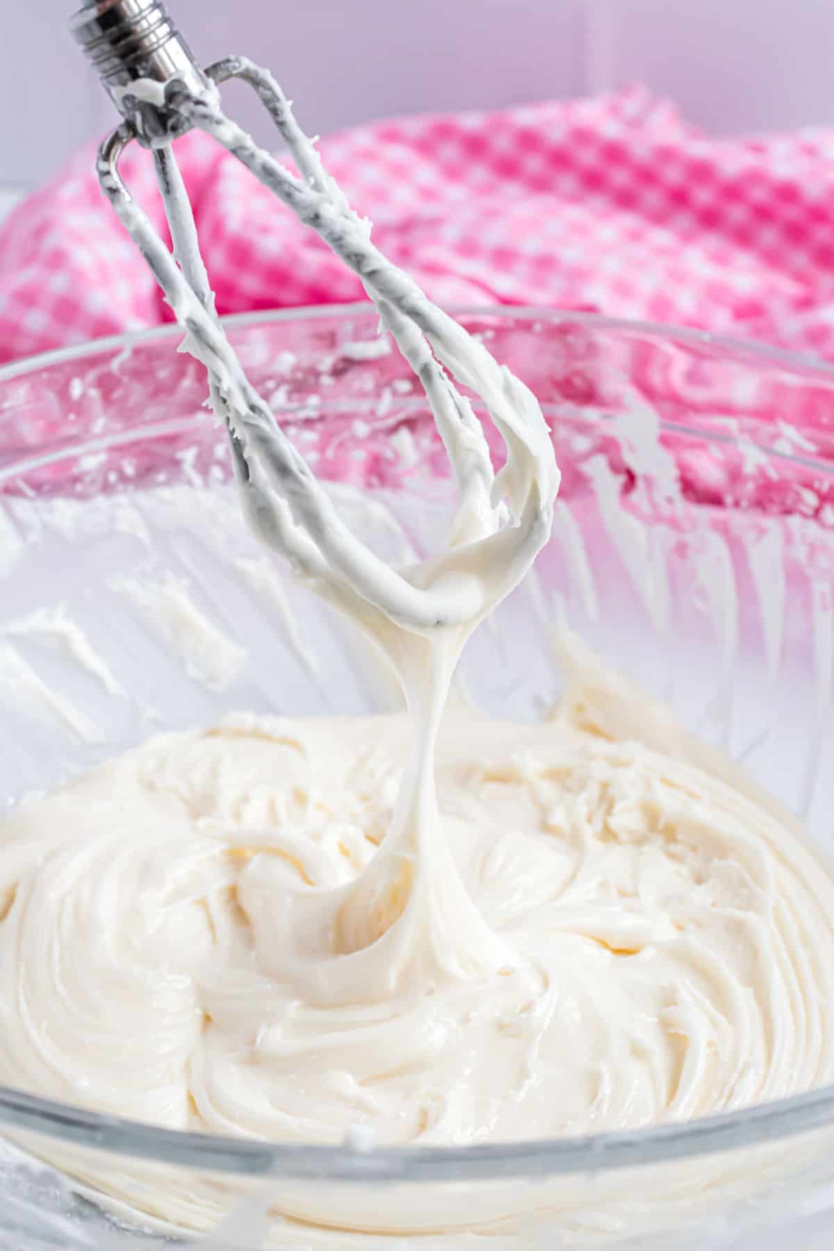 Marshmallow frosting in a clear mixing bowl.