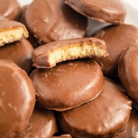 Homemade Tagalong Cookies make the perfect balance of buttery shortbread, fluffy peanut butter filling, and rich milk chocolate. No need to wait for Girl Scout season – whip up these irresistible classics right now! 