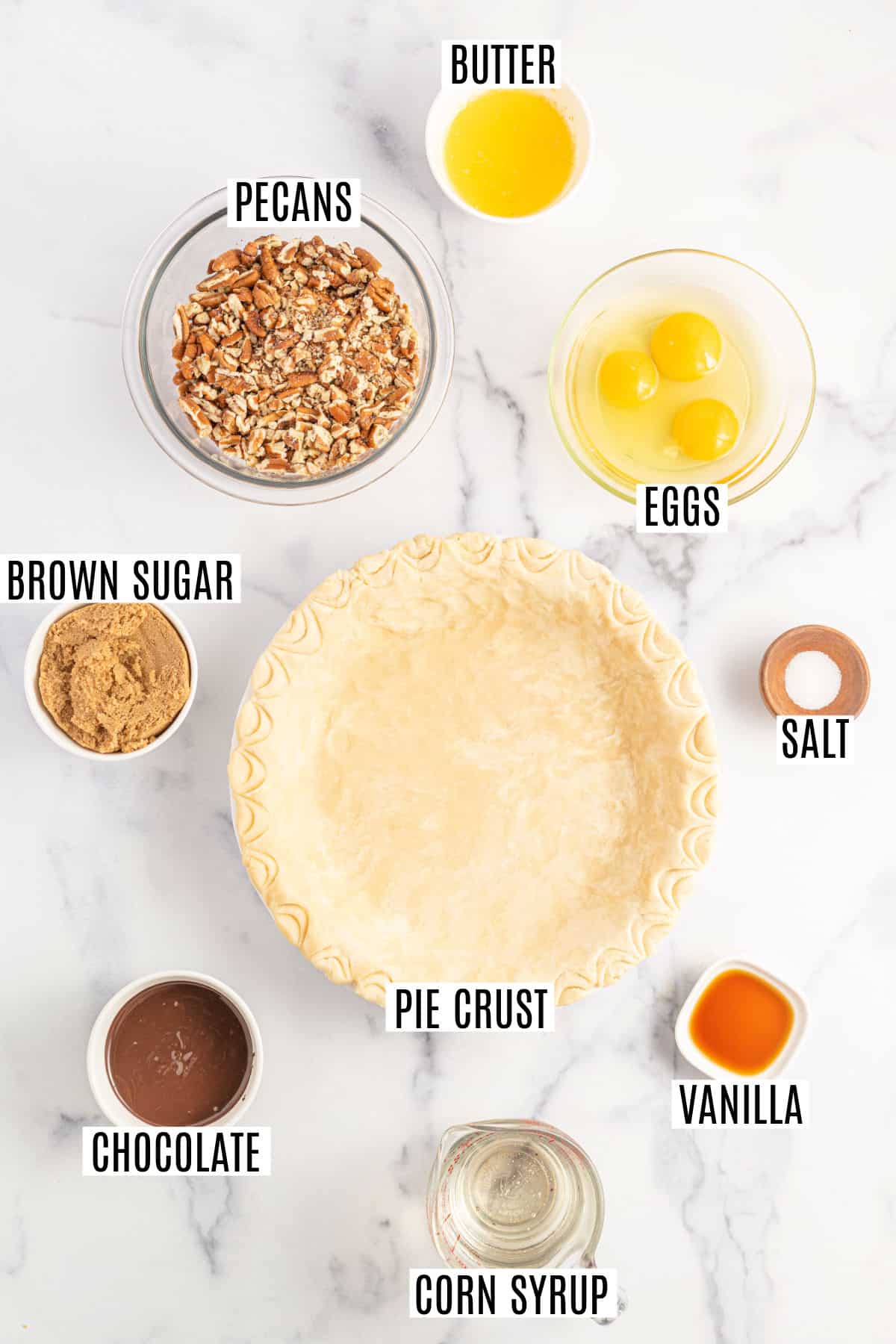 Ingredients needed to make chocolate pecan pie.