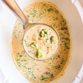 Slow Cooker Broccoli Cheese Soup is loaded with the goodness of veggies and rich yummy cheese. Super flavorful, and one of my all-time favorites. If you love Panera, I think you'll love this easy 10 minute prep soup!