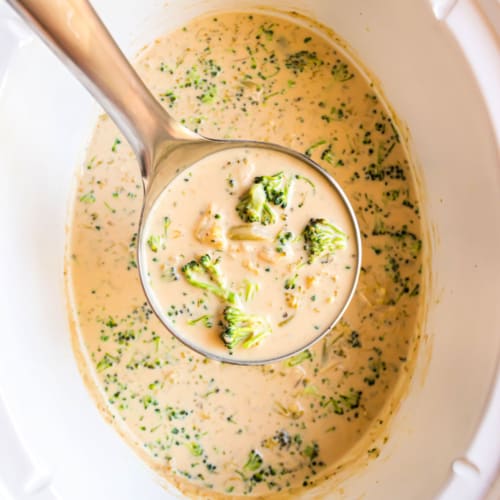 Slow Cooker Broccoli Cheese Soup is loaded with the goodness of veggies and rich yummy cheese. Super flavorful, and one of my all-time favorites. If you love Panera, I think you'll love this easy 10 minute prep soup!