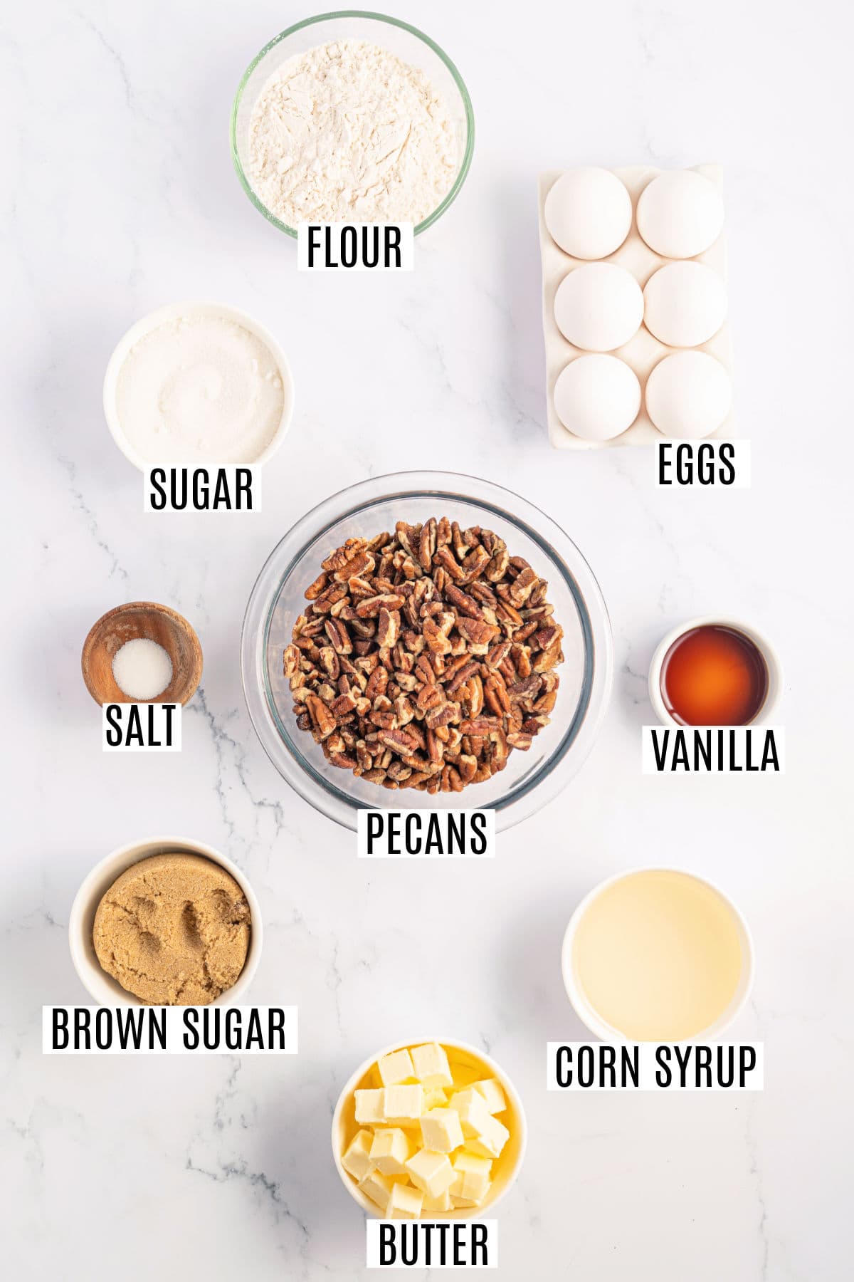 Ingredients needed to make pecan pie bars.