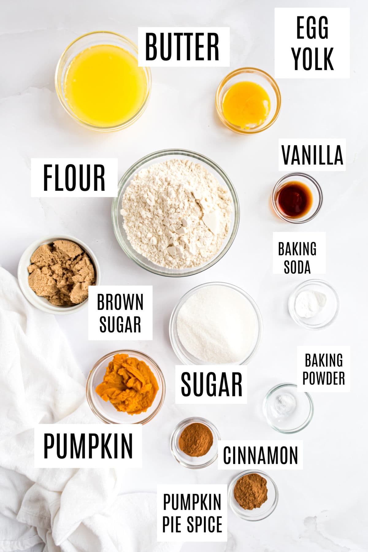 Ingredients needed to make pumpkin snickerdoodle cookies.