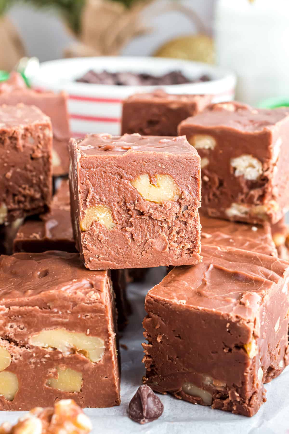 Chocolate fudge with walnuts stacked to serve.