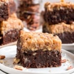 My German Chocolate Brownies are a rich, fudgy cocoa-infused treat. They’re topped with a rich and fudgy ganache and a sweet coconut-pecan frosting. Simply put - one bite is never enough.