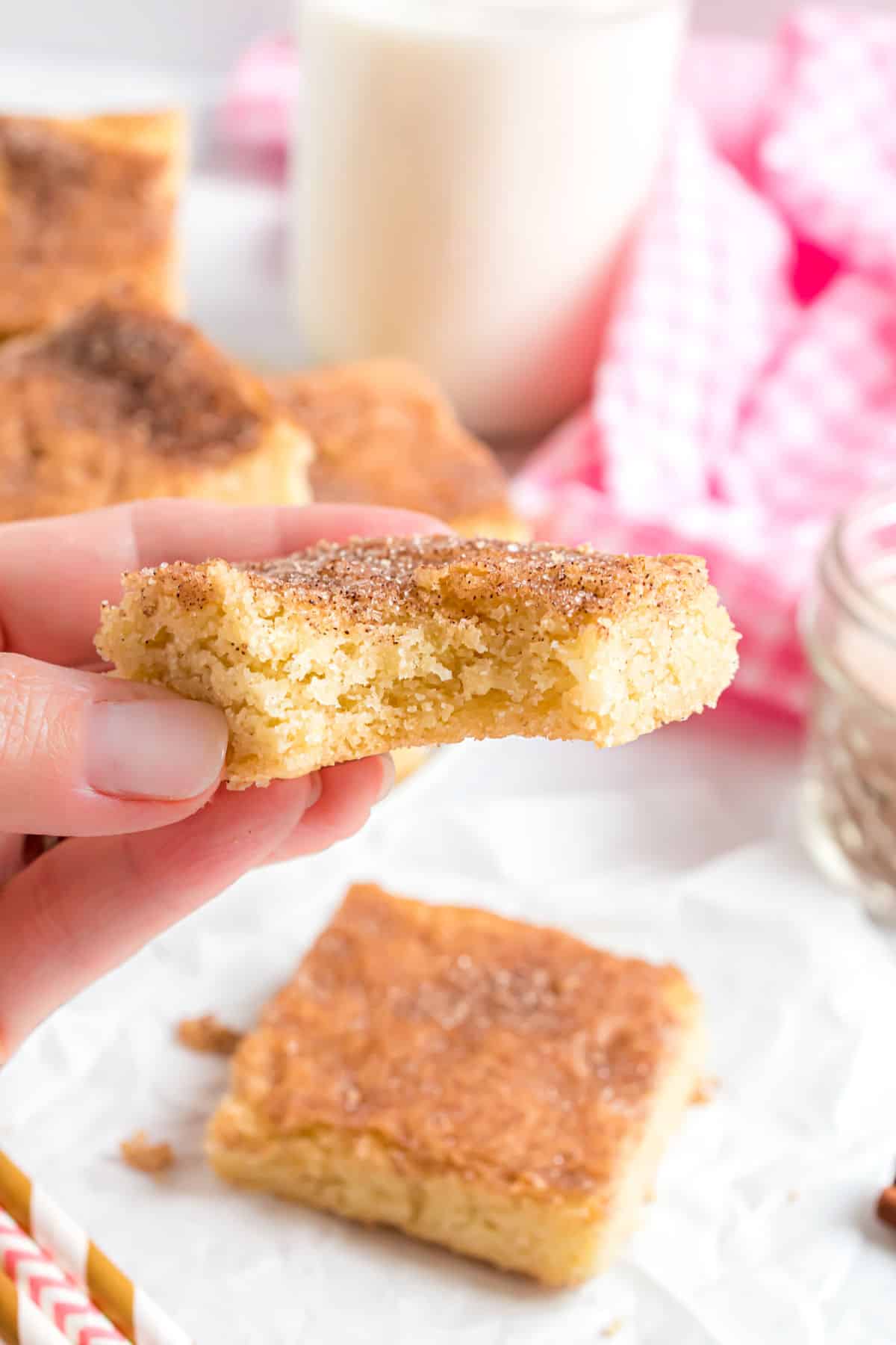 Snickerdoodle cookie bar with a bite taken out.