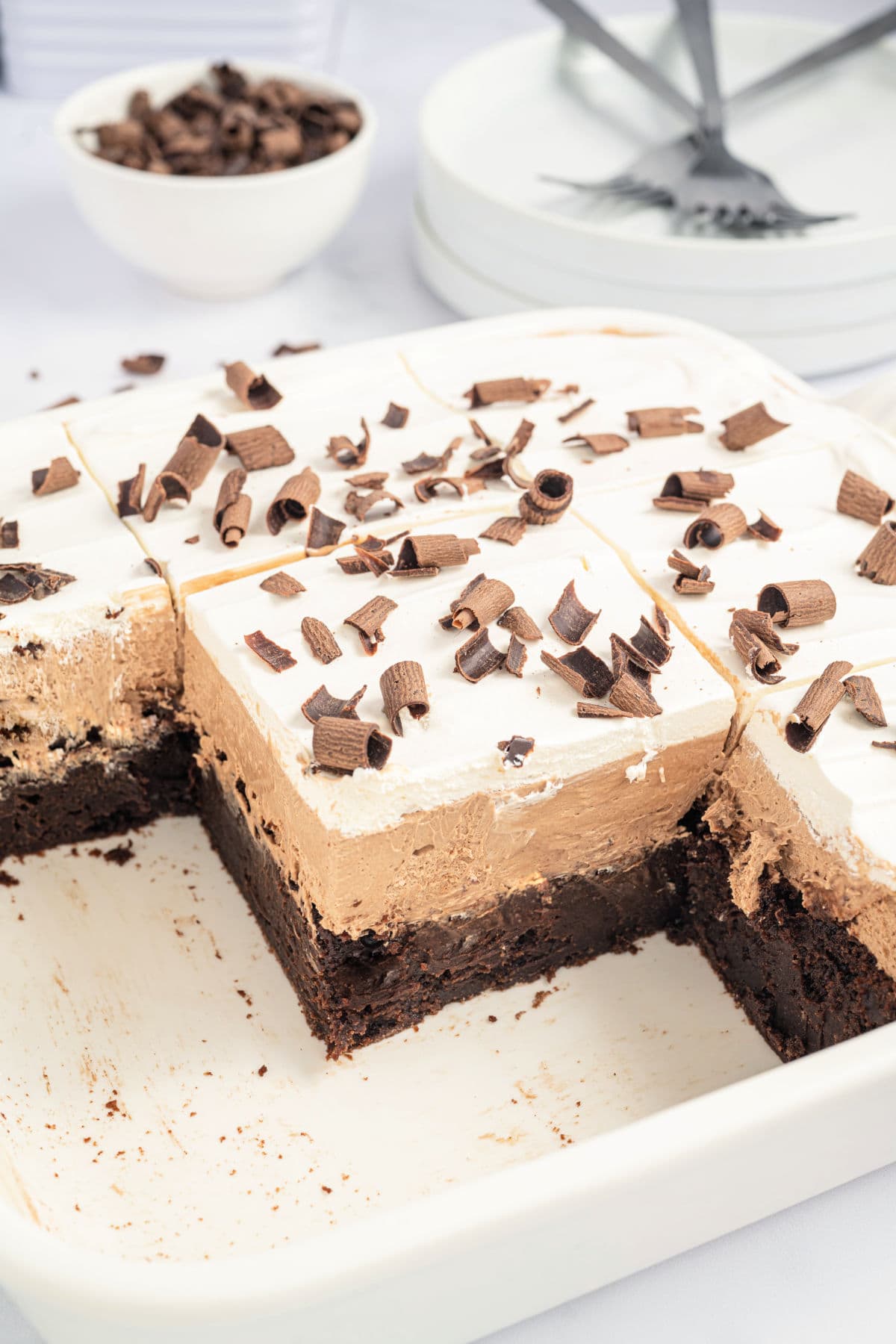 White baking dish with french silk brownies.