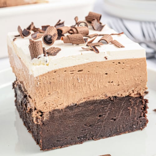 French Silk Brownies add layers of whipped topping and chocolate mousse on top of a rich, fudgy brownie base to create the ultimate dessert for chocolate lovers!