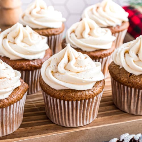 Gingerbread Cupcakes topped with creamy, dreamy eggnog frosting bring together the best flavors of the holidays in every bite. They’re super easy to make and will fill your house with the aroma of cinnamon and ginger as they bake. 
