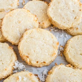 These slice-and-bake Coconut Shortbread Cookies are buttery, light, and airy. Packed with coconut on the inside and a light layer on the outside, these cookies will melt in your mouth.