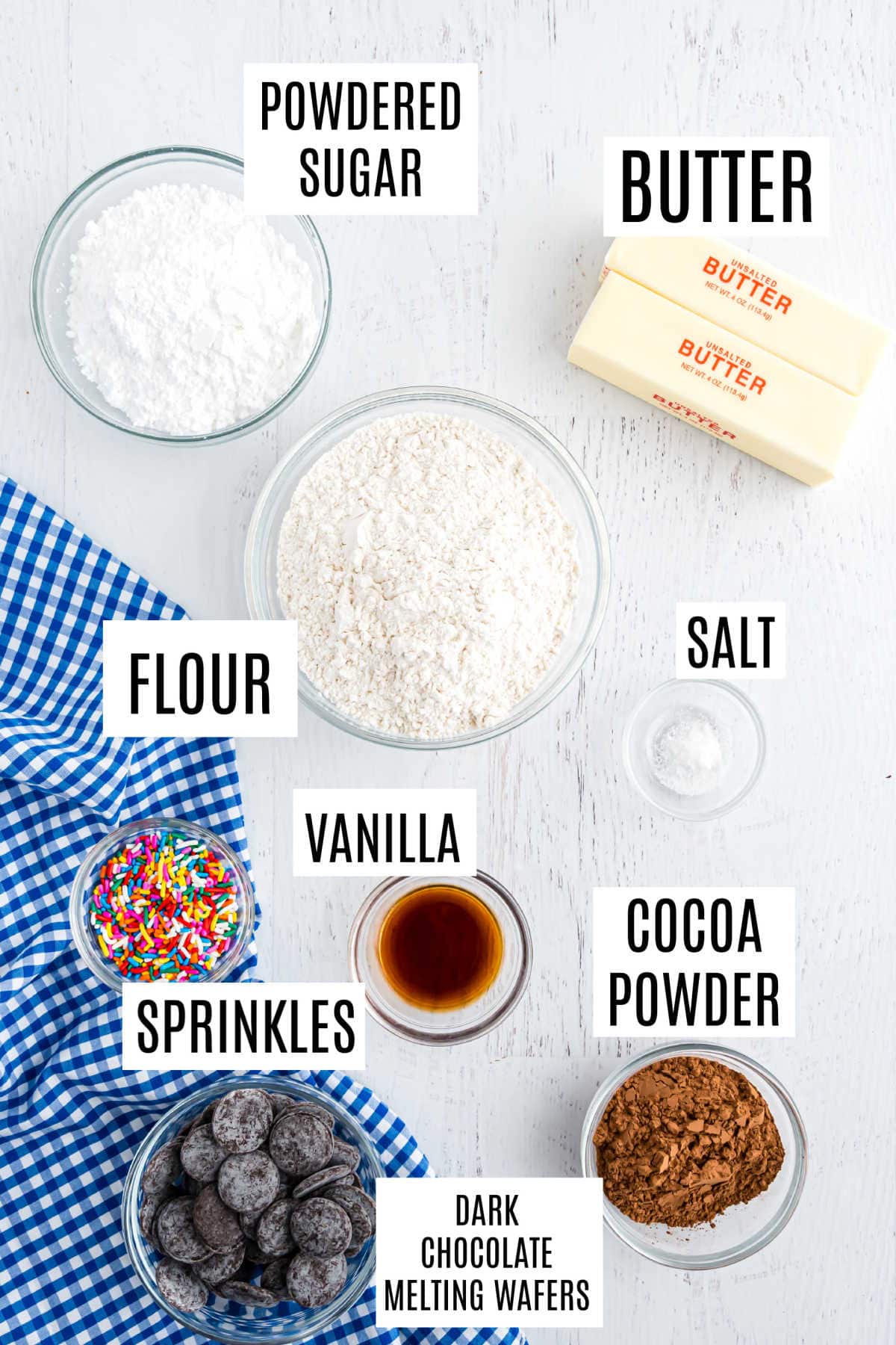Ingredients needed to make chocolate shortbread cookies.