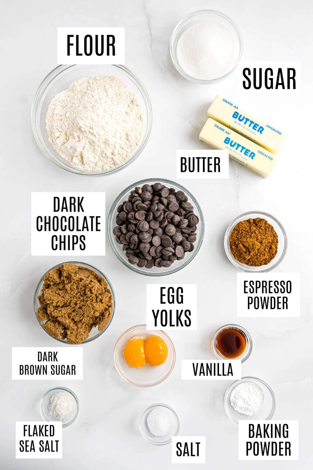 Baking ingredients labeled: flour, sugar, butter, chocolate chips, brown sugar, egg yolks, espresso, vanilla, salt.