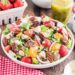 This copycat Panera Strawberry Pecan Salad is loaded with fresh berries and candied pecans. Tossed with a sweet homemade lemon poppy seed dressing, it's the perfect fresh salad warm summer days!